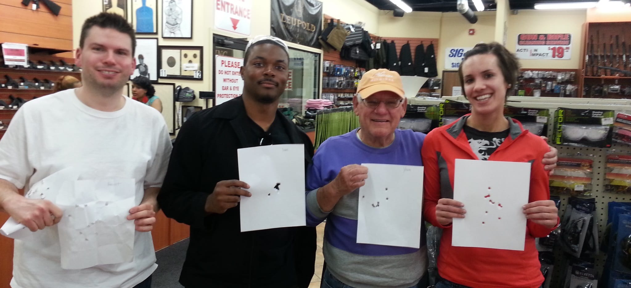 Steel and Stilettos students holding their targets after a Michigan CPL class